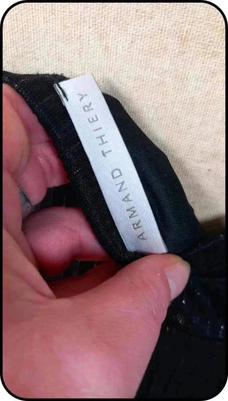 Jupe noir à fils métalliques marque Armand Thiery taille 44