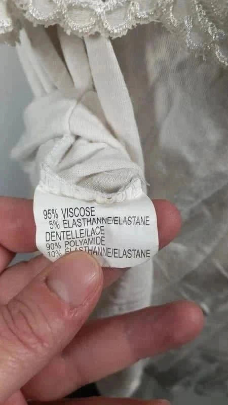 Beau débardeur blanc dentelle taille 56