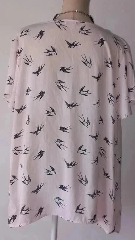 Belle blouse rose de la marque Modavista, taille 54
