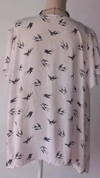Belle blouse rose de la marque Modavista, taille 54