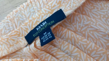 KIABI Sleeveless Blouse New M – Orange Yellow Flowy Top with Foliage Pattern