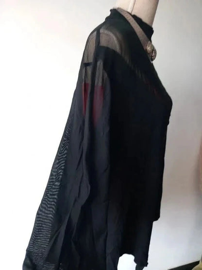 Joli body noir et résille en taille 56 de chez Asos, décolleté plongeant très sexy