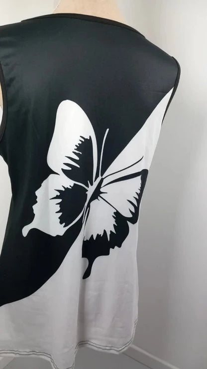 Top Fluide Noir & Blanc Motif Papillon – Détails Anneaux – Neuf – Taille L