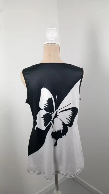 Top Fluide Noir & Blanc Motif Papillon – Détails Anneaux – Neuf – Taille L